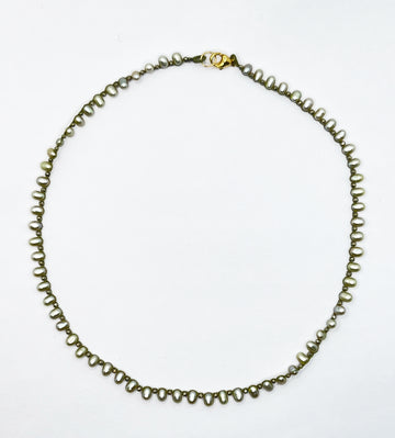 Danielle Welmond | Pyrite and Green Pearls on Woven Olive Silk Cord