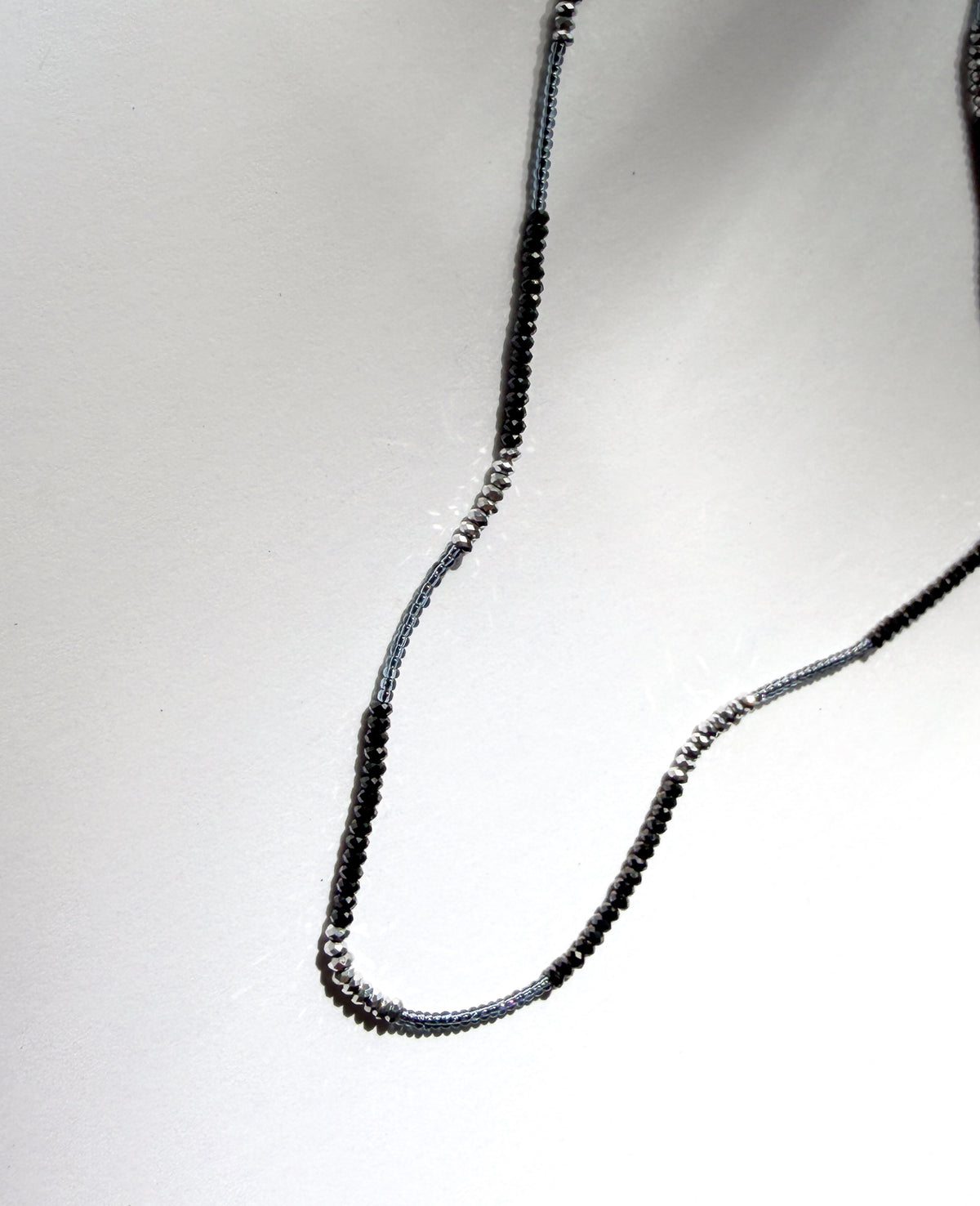 DEBBIE FISHER | Necklace of Grey Seed, Black Spinel, and Pyrite Beads