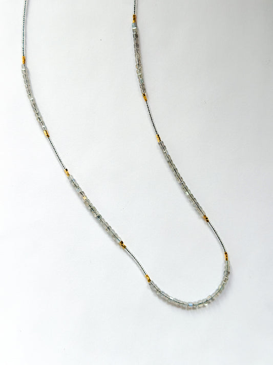 DEBBIE FISHER | Necklace of mixed Clear Glass Beads, Clear seed beads, and Gold beads