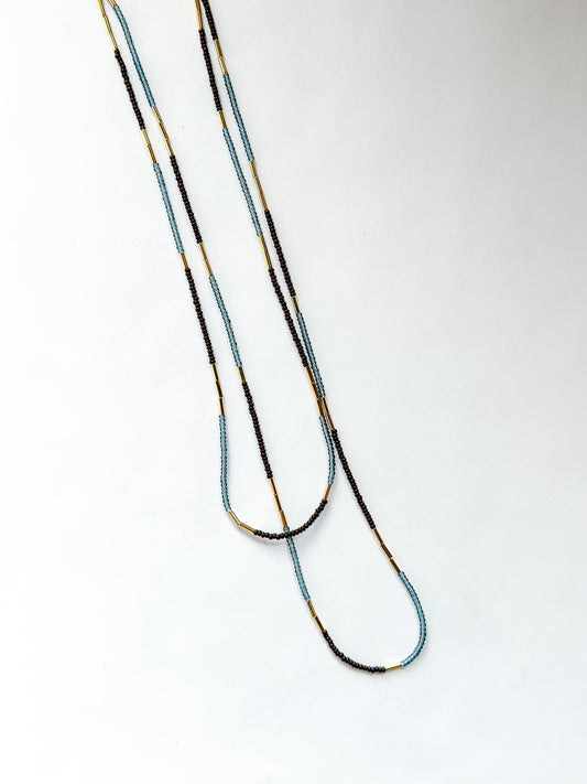 DEBBIE FISHER | Blue glass seed, gold beads, purple seeds