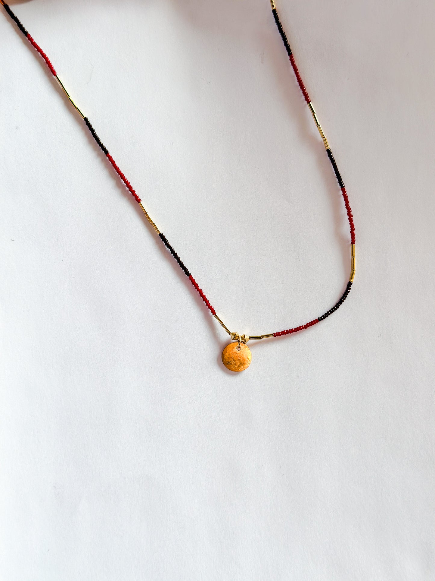 DEBBIE FISHER | Necklace of Dark Brown and Red Seed Beads with Charm