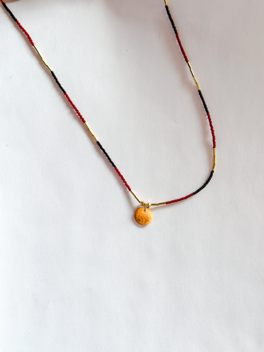 DEBBIE FISHER | Necklace of Dark Brown and Red Seed Beads with Charm