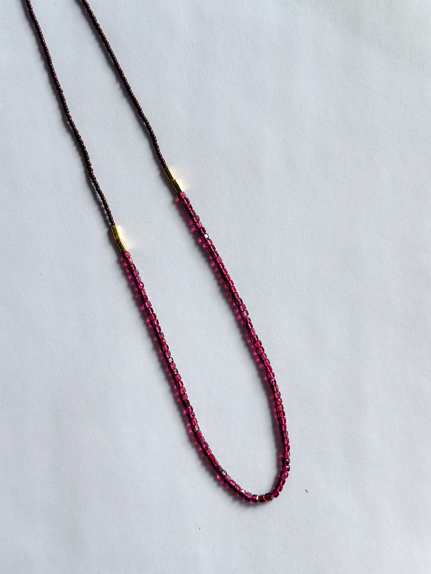 DEBBIE FISHER | Necklace of Dark Brown Seed, Gold Vermeil, and Garnet Beads