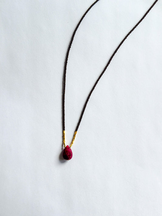DEBBIE FISHER | Necklace of Brown Seed, Pink Amethyst pendant with centered gold beads