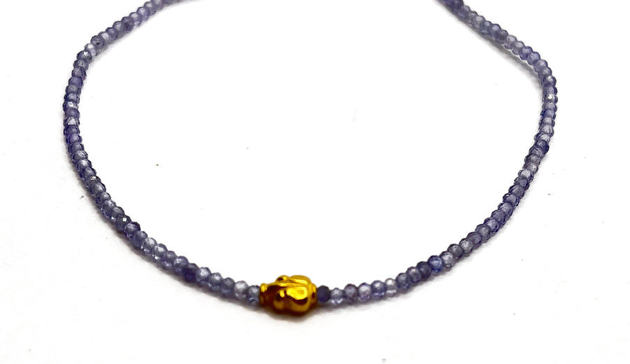 Margaret Solow | Tanzanite and 18KT Bracelet on silk cord
