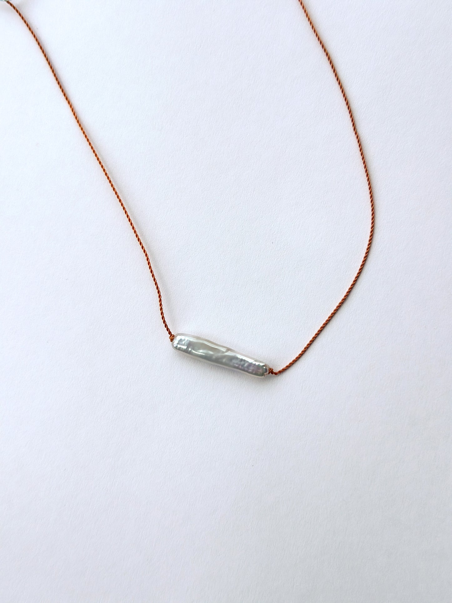 MARGARET SOLOW | Freshwater Pearl Necklace w/ Light Orange Cord