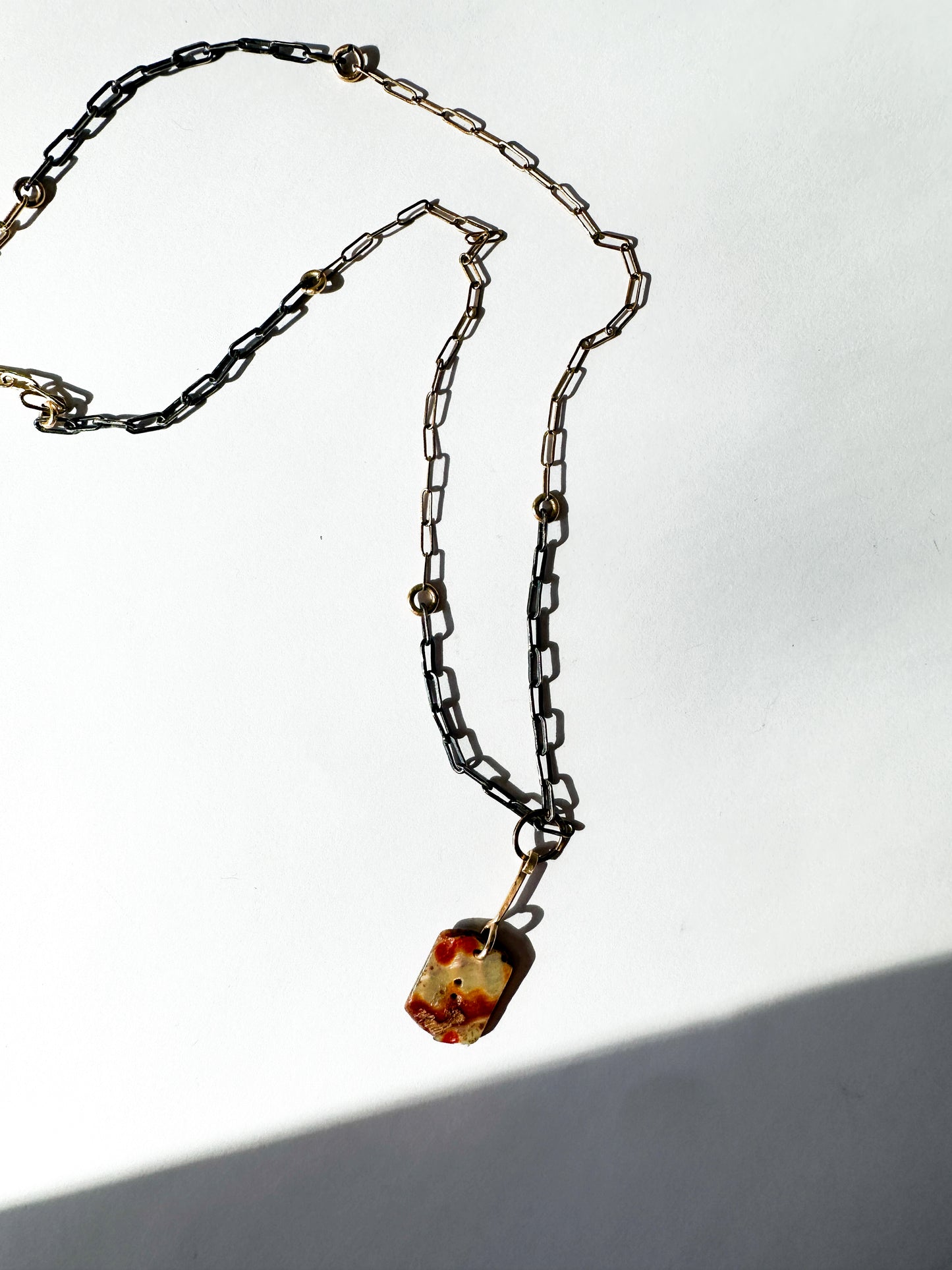 JADEWATER DESIGN | Carved Victorian Button with Gold Center; gold and silver chain