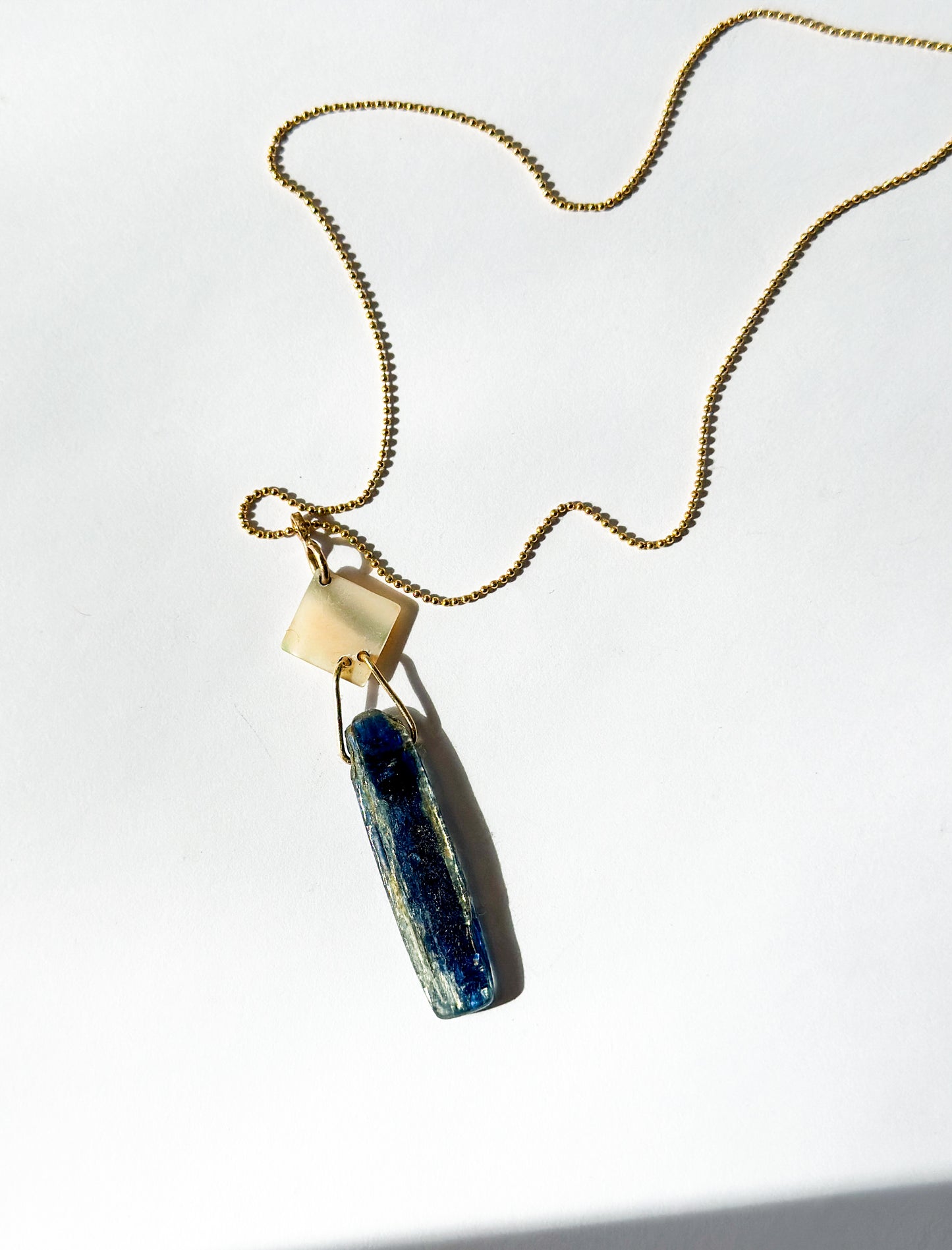 JADEWATER DESIGN | Iridescent Cufflink with Blue Kyanite Drop