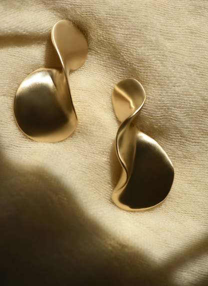 8.6.4 | Brass Wavy Studs