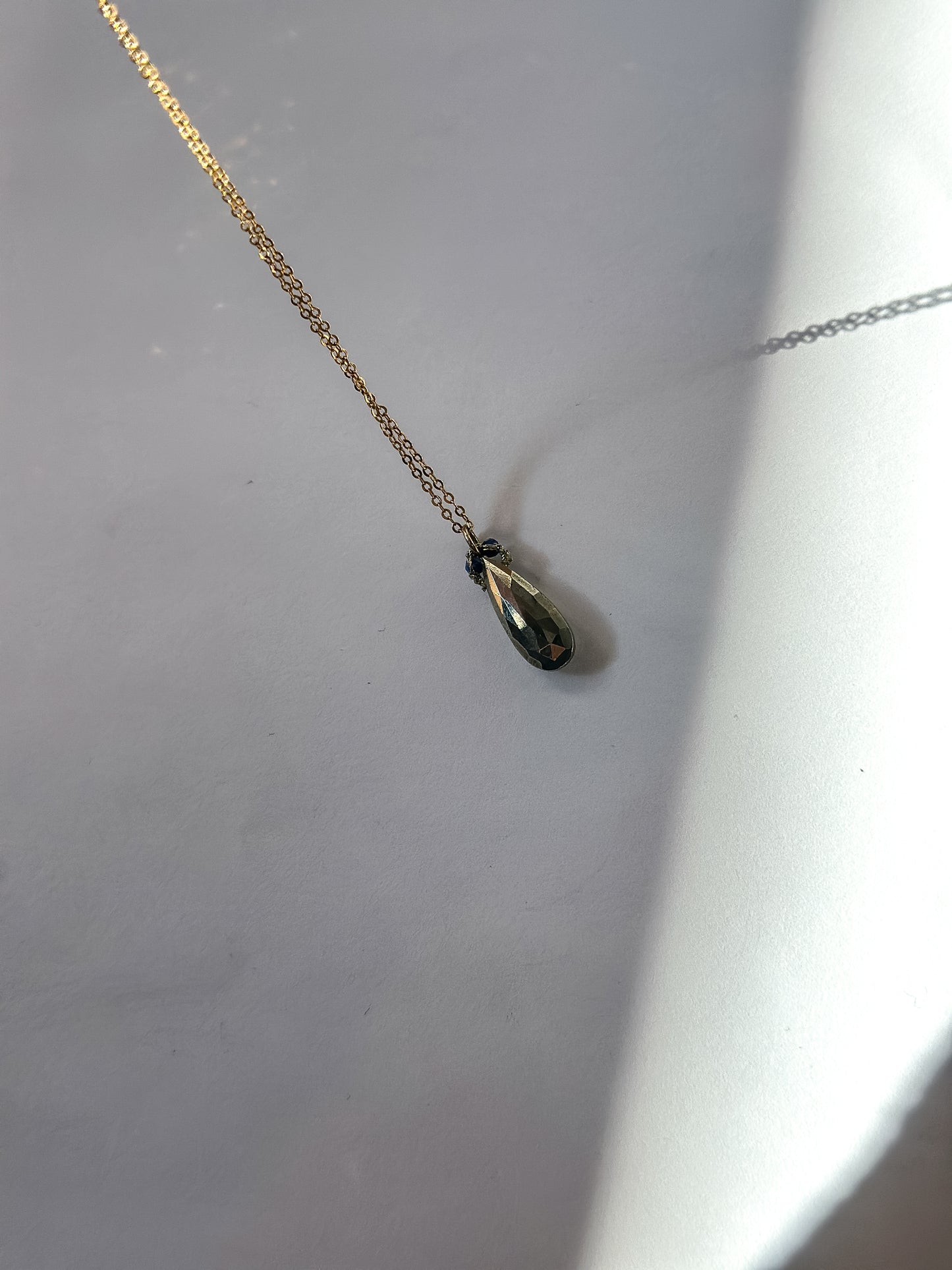 DANIELLE WELMOND | Pyrite Marquis Drop With Gold Cord and Black Spinel on Gold Plated Chain Necklace