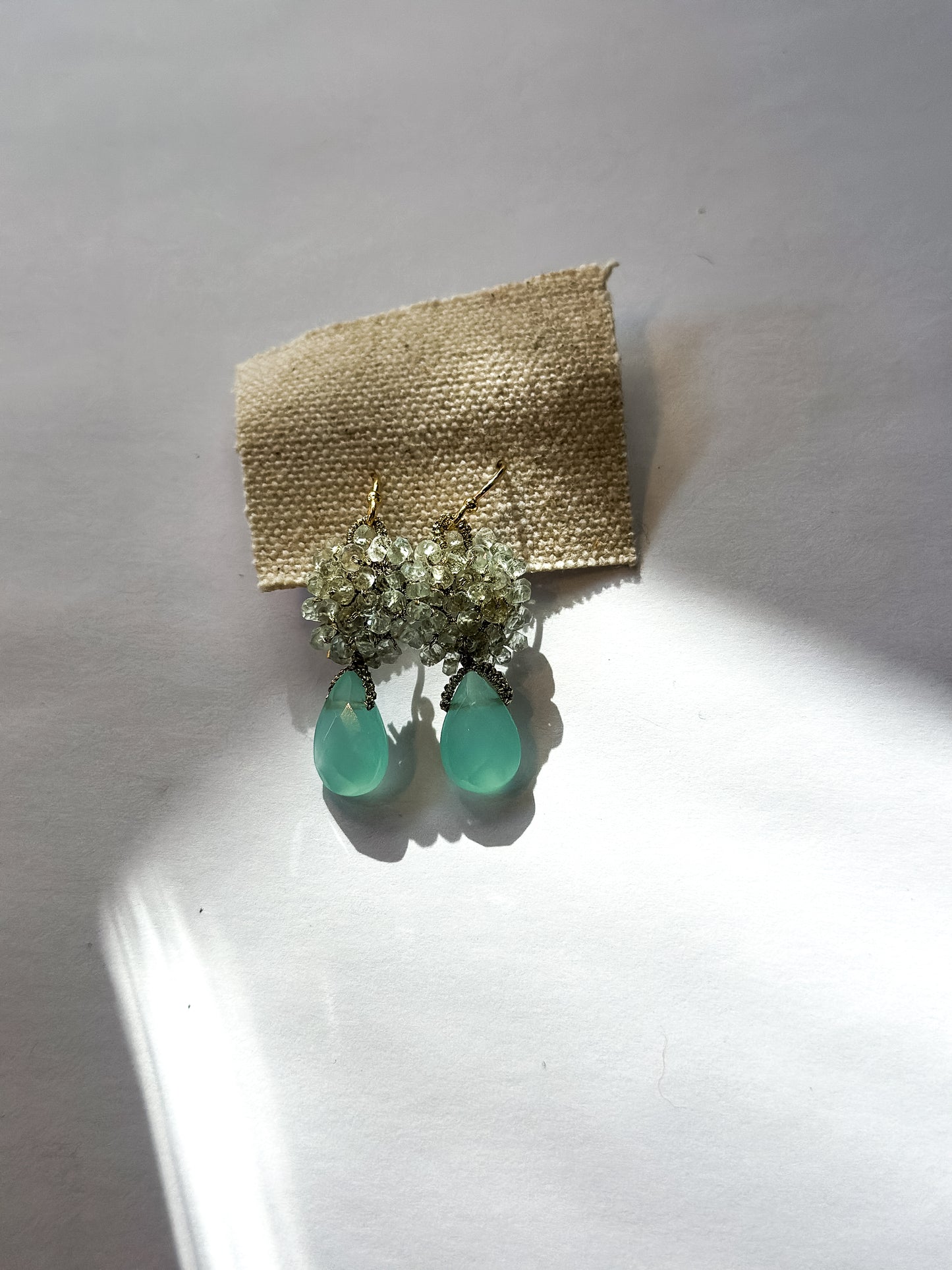 Danielle Welmond |  Earrings of Aquamarine Nuggets and Sea Blue Chalcedony with Woven Gold Cord