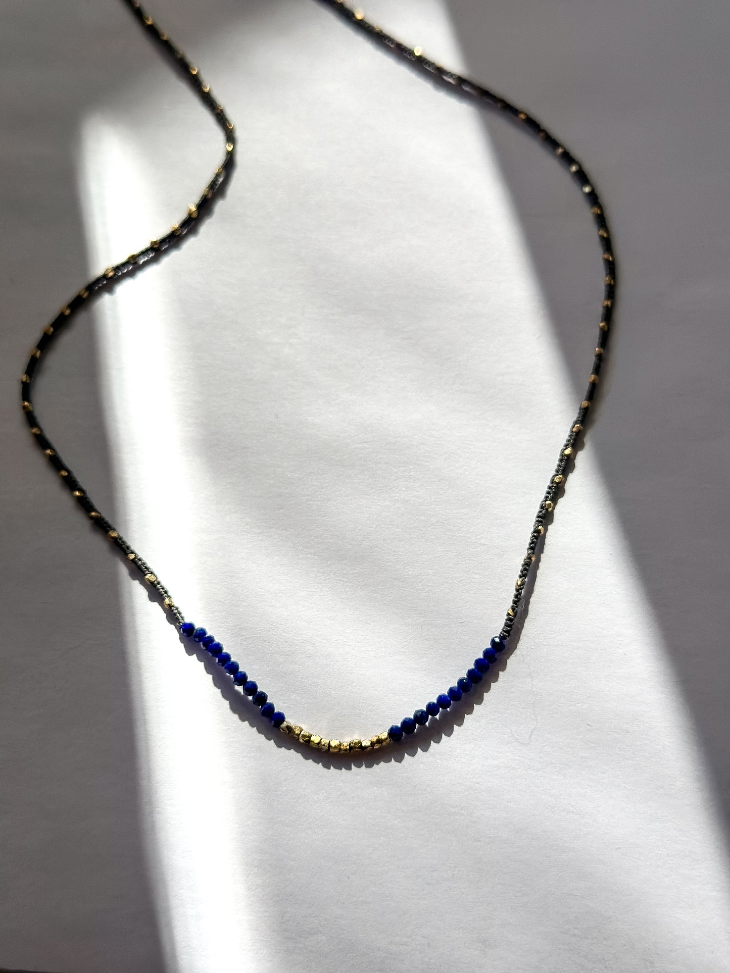 Danielle Welmond | Woven Dark Grey Silk Cord Necklace w/ Lapis and 14K Gold Vermeil Beads