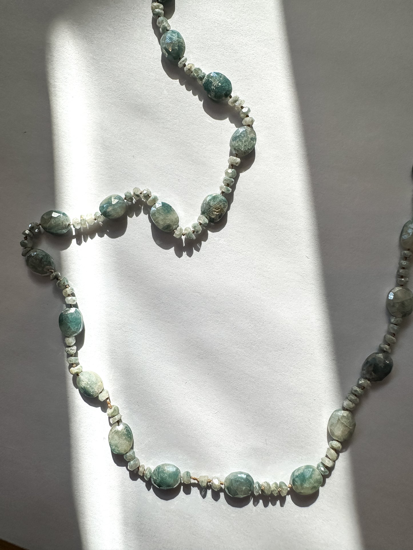 Knotted Tan Cord With Oval Faceted Blue Selvenite Necklace