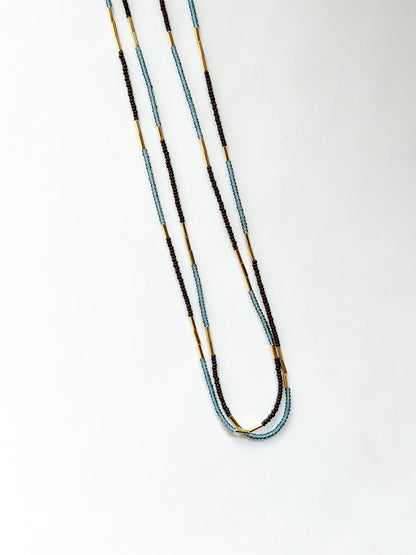 DEBBIE FISHER | Blue glass seed, gold beads, purple seeds