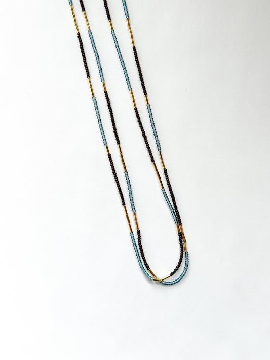 DEBBIE FISHER | Blue glass seed, gold beads, purple seeds