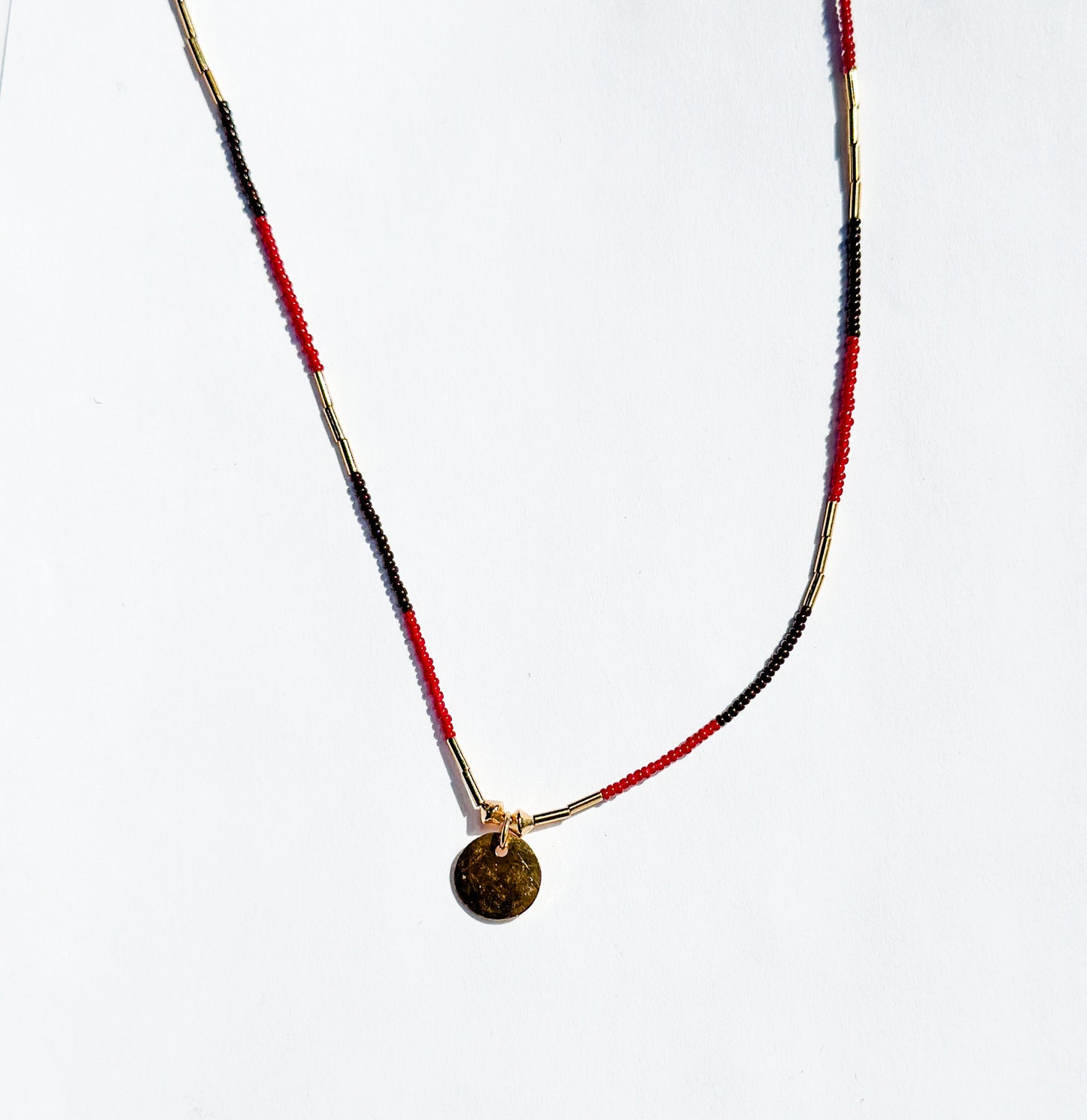 DEBBIE FISHER | Necklace of Dark Brown and Red Seed Beads with Charm