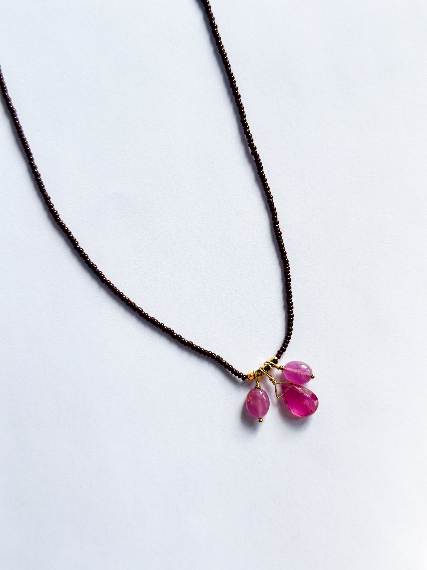 DEBBIE FISHER | Necklace of Brown Seed and Pink Sapphire Bead Drops