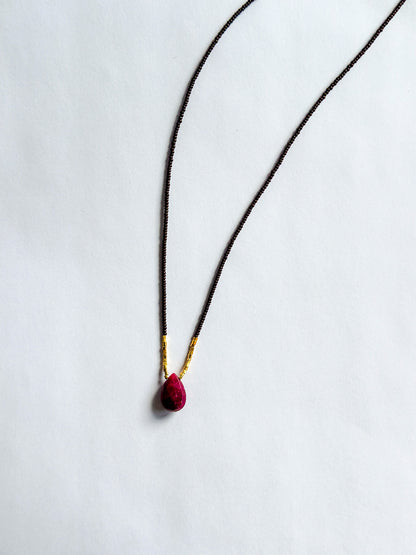 DEBBIE FISHER | Necklace of Brown Seed, Pink Amethyst pendant with centered gold beads